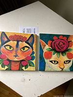 Both canvas cat prints side by side showing size and imagery