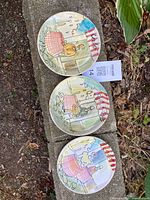 All three hand-painted Italian plates front view