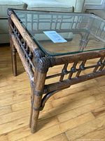 Full view of bamboo coffee table with glass top