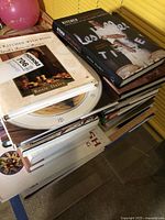Stack of cookbooks side view