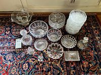 All 29 glass pieces laid out on rug