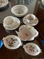 Group shot of all porcelain pieces on table