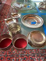 Group shot of all silver-plated items on table