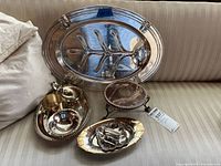Group shot of all silver-plated serving pieces
