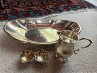 All four sterling pieces together