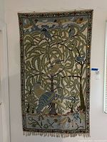 Full view of tapestry hanging on wall