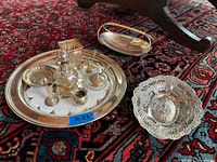 Group view of all silverplate items and tray