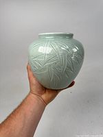 Front view showing overall shape and carved bamboo design