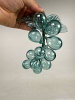 Full view of glass grape cluster showing all grapes and stem