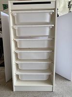 Full frontal view showing shelf frame and six totes inserted
