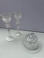 Overall view of two cordial glasses and butter dome with plate