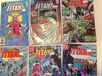 Front covers of all six Teen Titans comics laid out