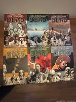 Front covers of all six volumes displayed