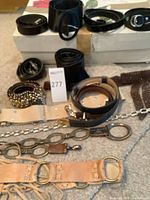 Overview of all belts rolled and laid out