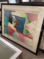 Front view of framed Peter Max print showing artwork, frame and mat