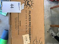 Sealed box labeled Pilates Pro Chair Max by Life's A Beach