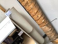 Side view of cream runner stored horizontally on shelf