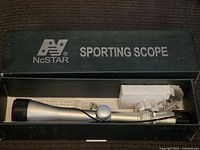 Sporting scope in the original box showing the scope and accessories.