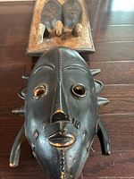 Front view showing main face and dual faces crest