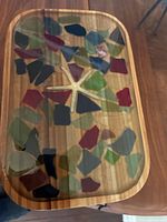 Top view showing bamboo frame and resin-encased sea-glass with starfish