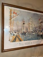 Angled left view of framed print showing tall ships scene and frame detail