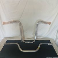 Both handlebars displayed upright