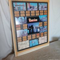 Full view of framed collage showing photos, tickets, frame