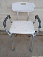 Front view of adjustable shower chair