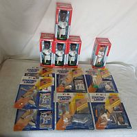 Group shot of all boxed bobbleheads and Starting Lineup packages