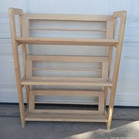 Frontal view of full wooden shelf unit