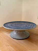 Full view of stoneware pedestal cake stand