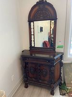 Full view of cabinet with attached mirror