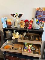 Overall view of assorted decor pieces on shelving