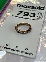 Ring on lot tag showing overall appearance and scale