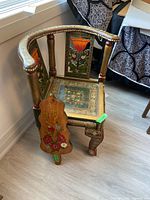 Chair and paddle board showing overall appearance and size