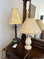 Both lamps on dresser showing overall appearance