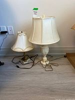 Both table lamps side by side showing design, bases, shades, cords