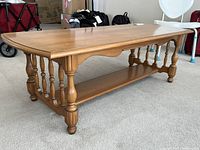 Side view showing overall table, shelf and legs