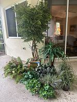 group view with all artificial plants and tall faux tree