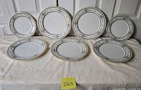 Front view showing all seven plates on display