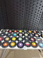 All 30 records laid out in rows on table