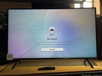 Television front view powered on showing HDMI no-signal screen