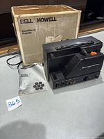 Projector with box and manual overview