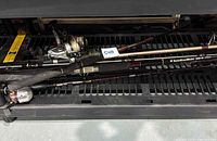 Six fishing rods and reels stacked together