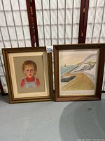 Both framed artworks side by side