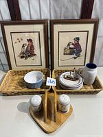 Group shot of all items including prints, baskets, tableware, décor