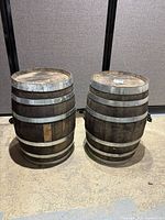 Two oak barrels side by side