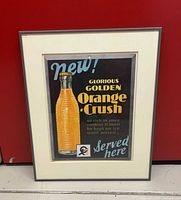 Framed Orange Crush advertising poster overall view