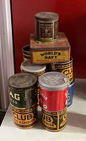 Group view showing stack of tins including MacDonald’s, World’s Navy and multiple Club tins