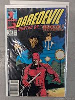 Front cover of Daredevil Issue 229 featuring Daredevil in red costume with claws and title text 'Hunted by the Bengal!'